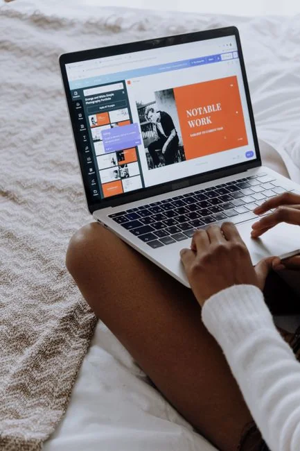 A contemporary workspace showcasing a laptop, tablet, and smartphones, ideal for tech and freelance use.